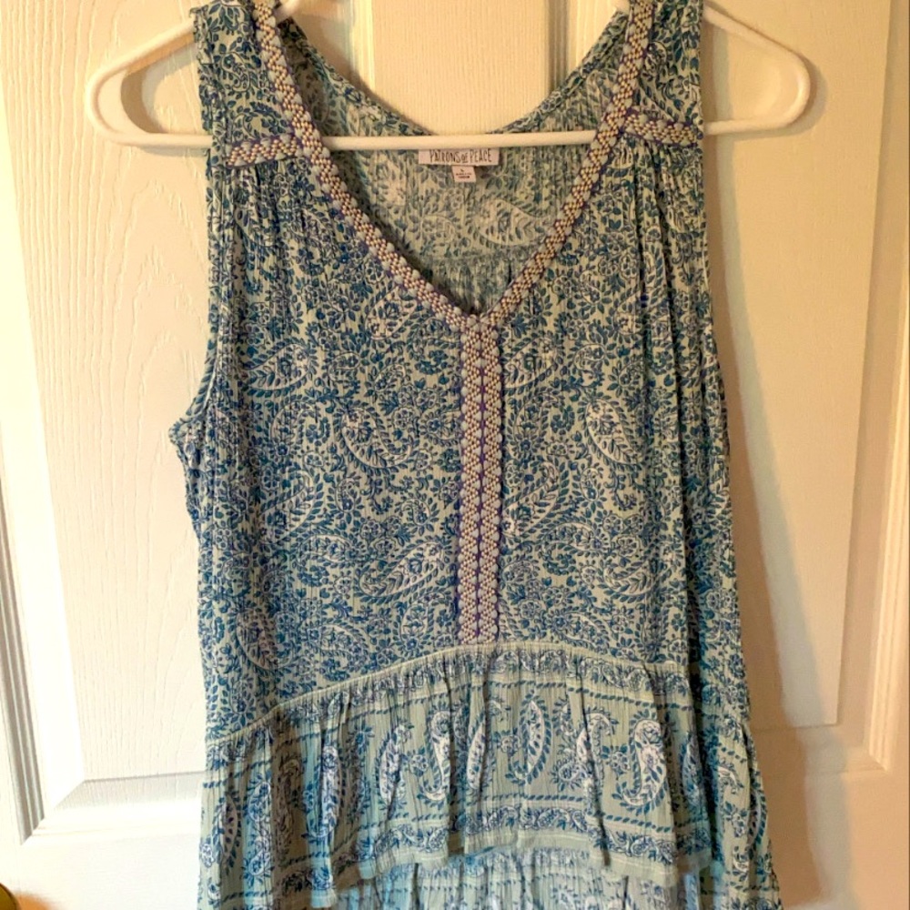 Blue shirt. Size large. Never been worn.